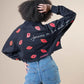 'KISSES' Painted Sweatshirt Rebelle Theory