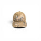 Beige cap with blue floral designs on a white background