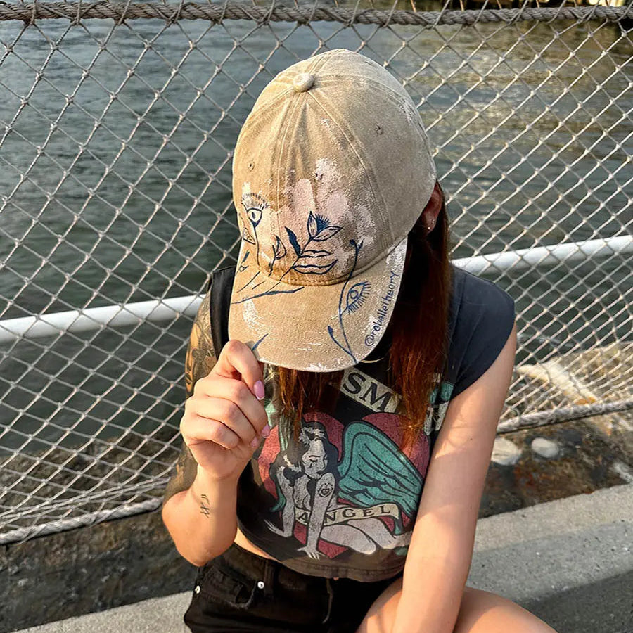 women wearing cap with flowers