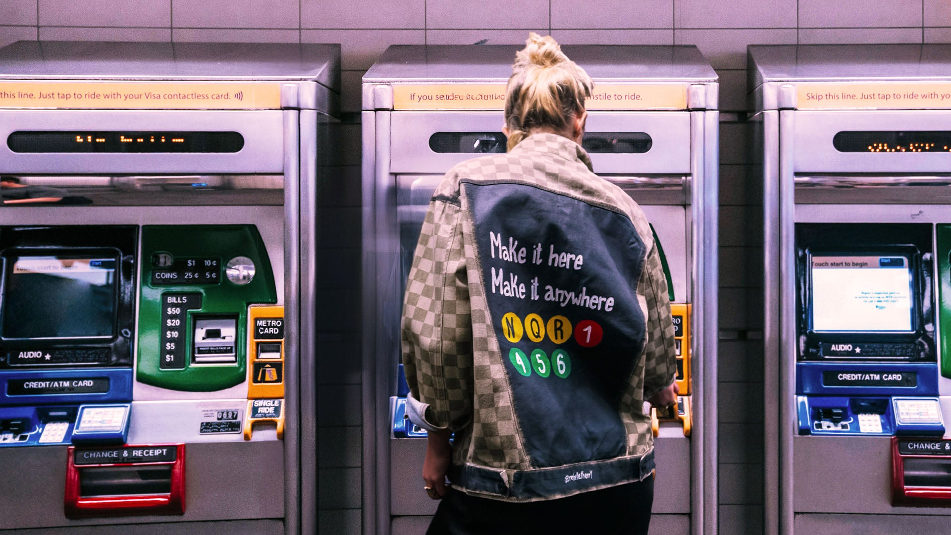 person wearing a hand painted jacket with subway theme in New York City